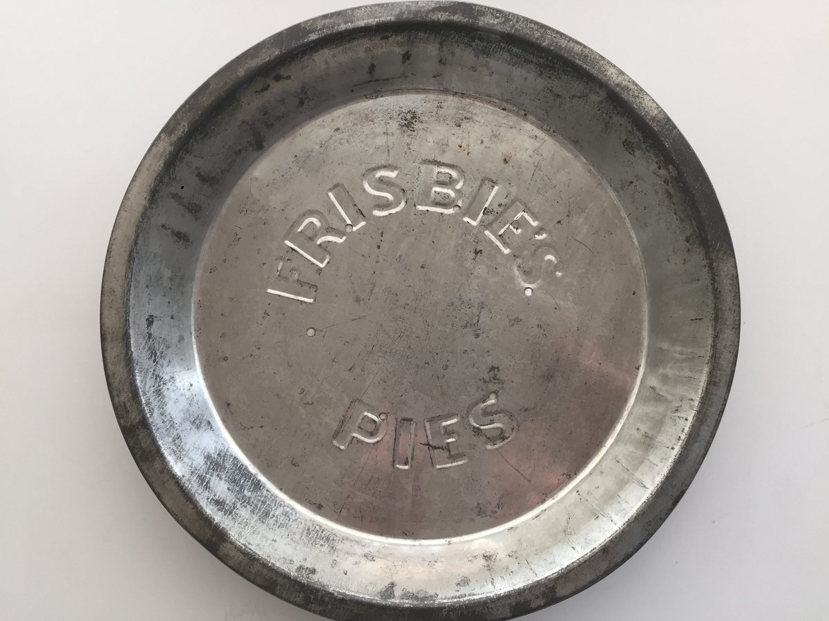 A vintage Frisbie's Pies tin plate, the ancestor of the flying disc